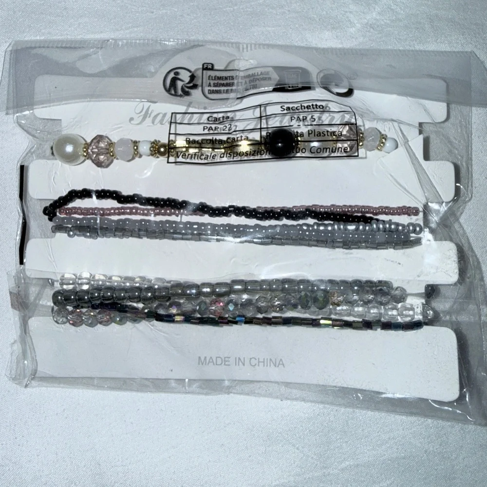 NWT black, silver, white Beaded Bracelet Set